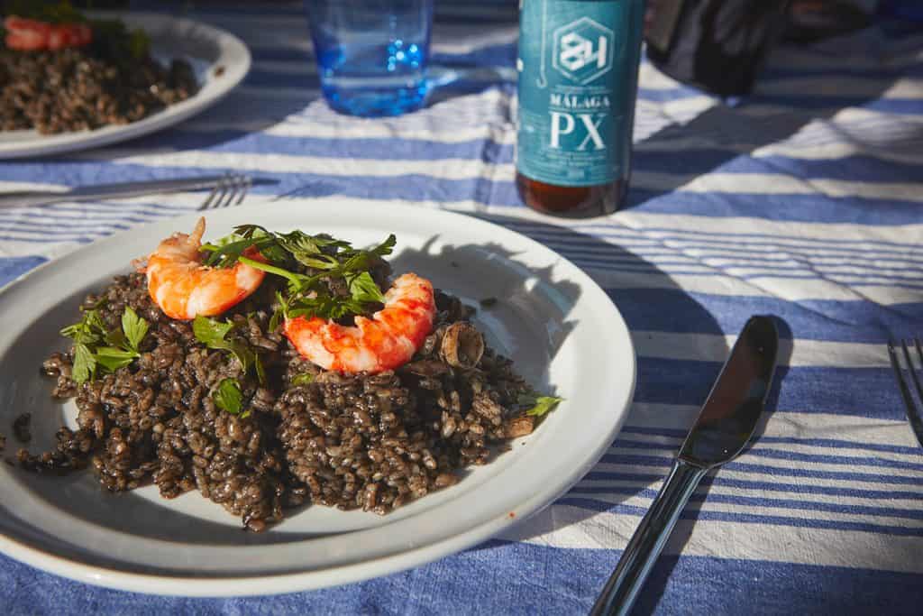 Malaga cooking experience - food black rice on table