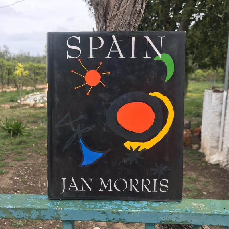 book about spain with field in background
